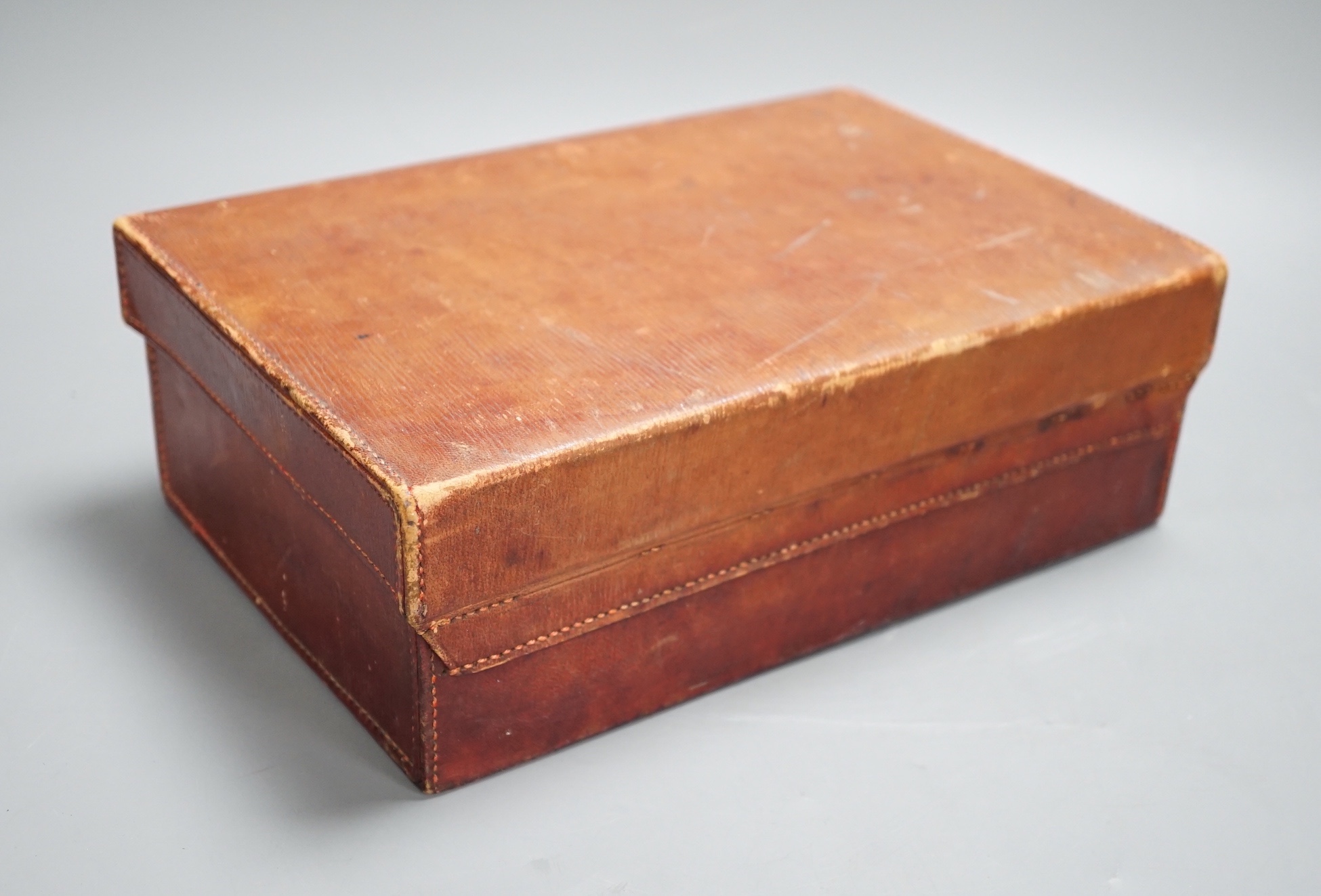 A Vintage Asprey red leather case, 28cm